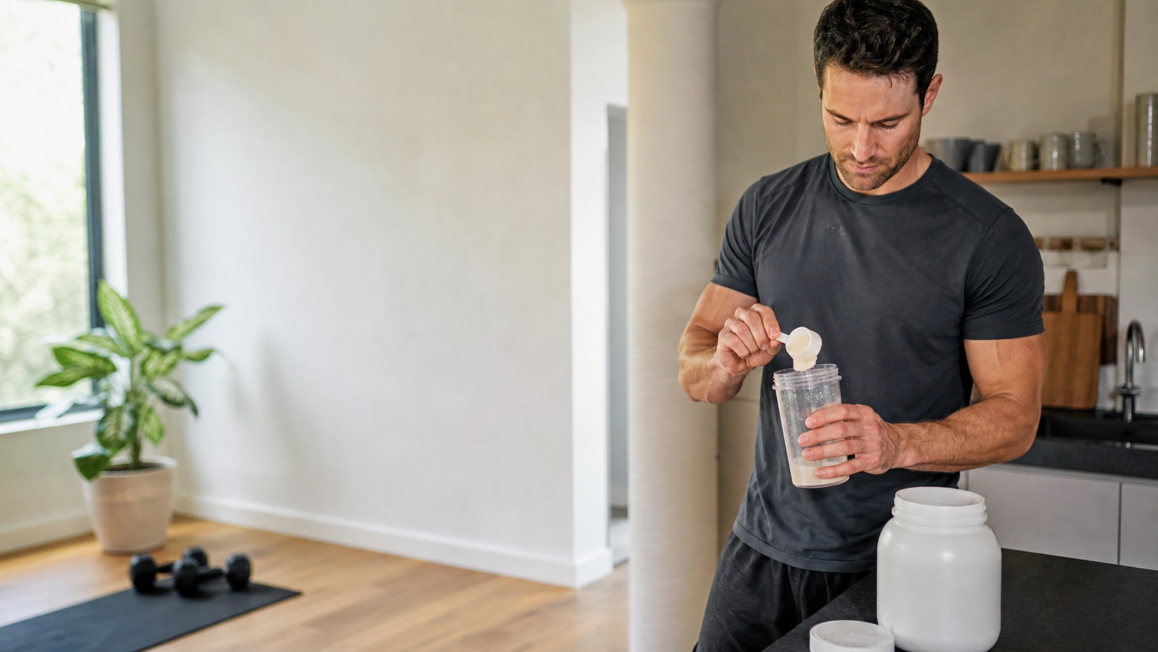 Athlete preparing a supplement drink after training